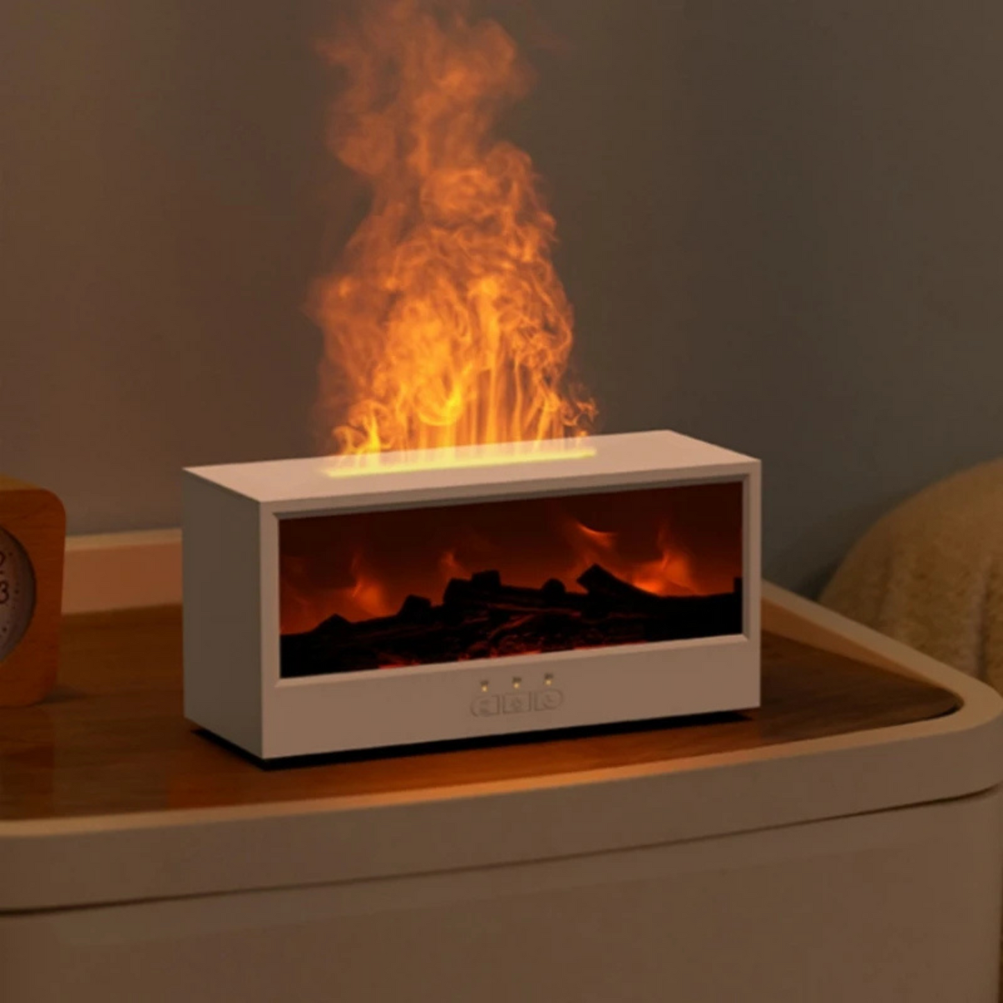 Diffuseur Flamora blanc en ambiance détente avec brume et lumière flamme