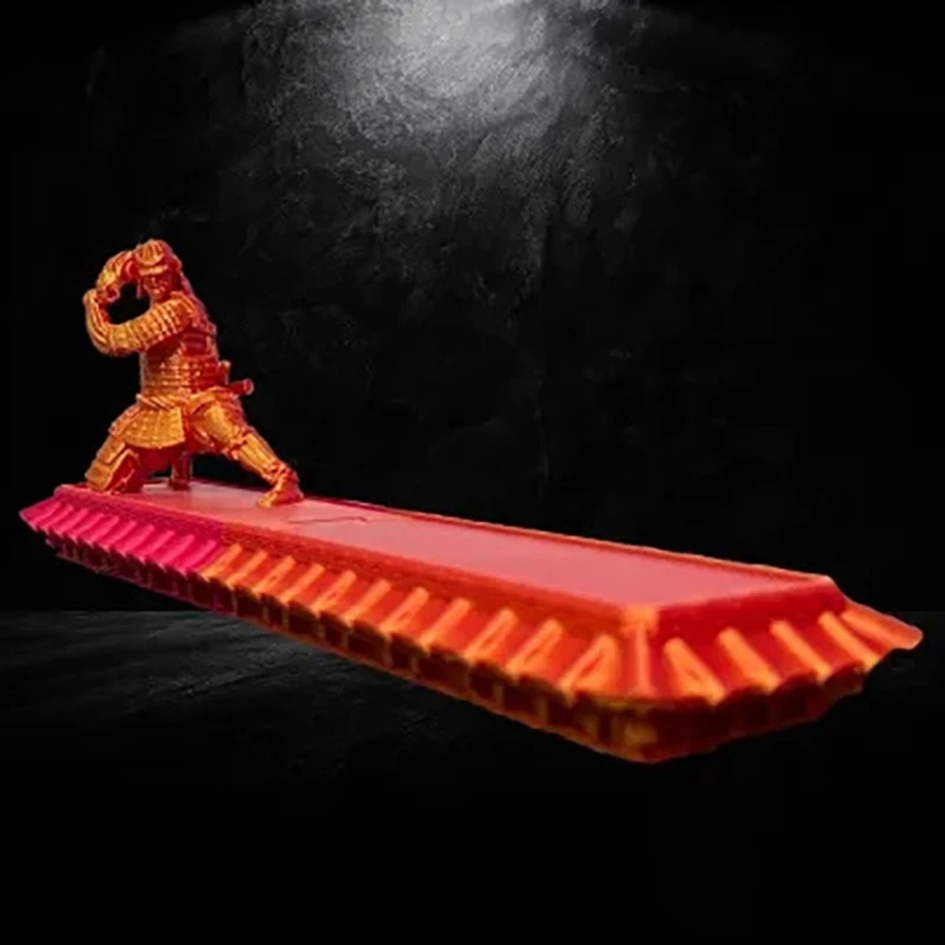 Brûleur d’encens Kenzaku orange – statuette japonaise en résine avec reflets cuivrés