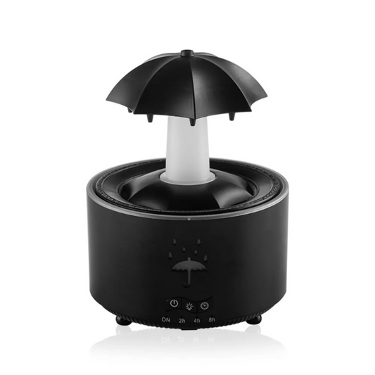 Diffuseur d huiles essentielles Oraya Noir avec brume visible sur fond blanc